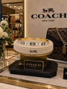 Coach White Enamel and Gold-Tone Signature Bangle & Dustbag